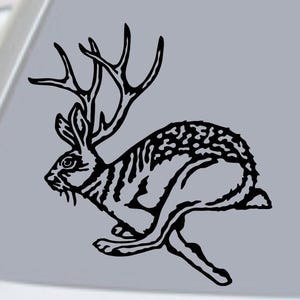 Peut inclure: Illustration en noir et blanc d'un jackalope, créature mythique avec le corps d'un lapin et des bois de cerf, en position de course. L'image a un style vintage et est sur fond gris. Le texte "Vintage Treasures Galore DO NOT COPY!" est en bas à droite.