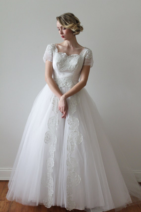 Vintage 1950s Slight off the Shoulder Short Sleeved Wedding Dress with Hand Painted Lace Details Vintage 1950s Slight off the Shoulder Short Sleeved Wedding Dress with Hand Painted Lace Details
