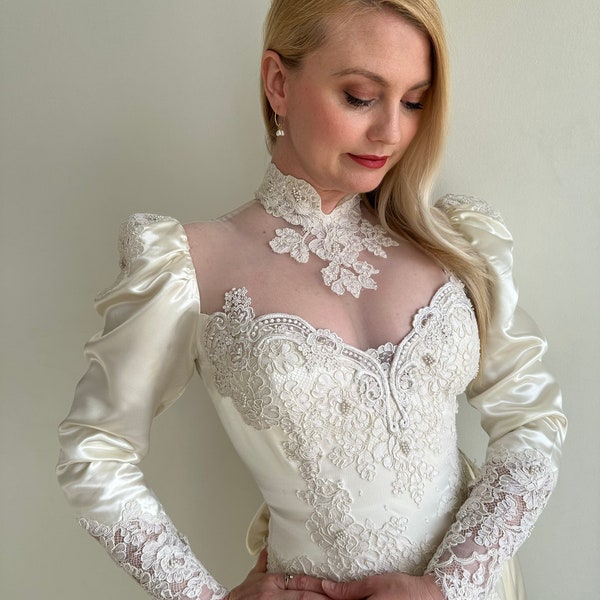 Vintage 1980s - 1990s Satin Long Sleeve Wedding Gown with High Neck Illusion Bodice and Floral Lace Details