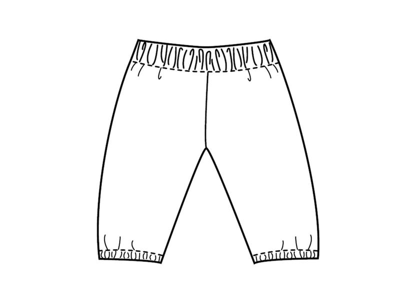 Child wearing handmade elastic waist pants in colorful fabric