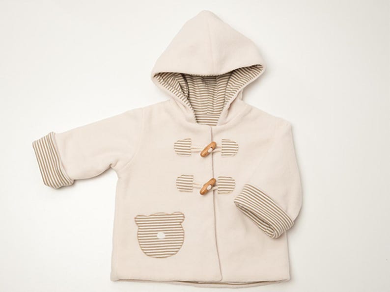 Kapuze nah, Jacke komplett flach gezeigt, Taschen und Streifenfutter, walkjacke baby schnittmuster Hinweis