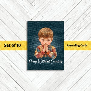 May include: Journaling cards featuring a vintage illustration of a child with hands clasped in prayer. The child wears a patchwork shirt. Text on the card reads "Pray Without Ceasing". The set includes 10 cards.