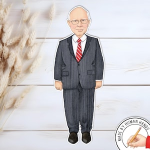 May include: A watercolor illustration of a man in a dark gray suit with a red and white striped tie, glasses, and black shoes. The image is a cut-out sticker on a white background. The text "MADE BY HUMAN HANDS" is in the lower right corner.