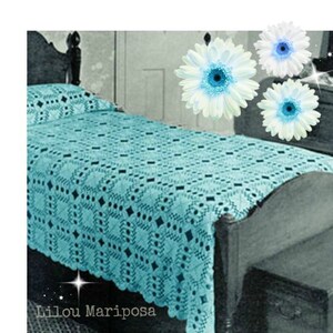 May include: A turquoise crocheted bedspread with a diamond pattern on a wooden bed frame. The bedspread has a scalloped edge. There are three white and blue flowers in the background.