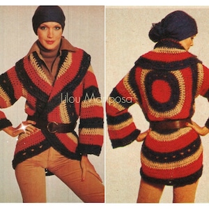 May include: A crochet cardigan with a red, white, and blue striped pattern. The cardigan has a wide collar and long sleeves. The cardigan is shown on a model wearing a hat.