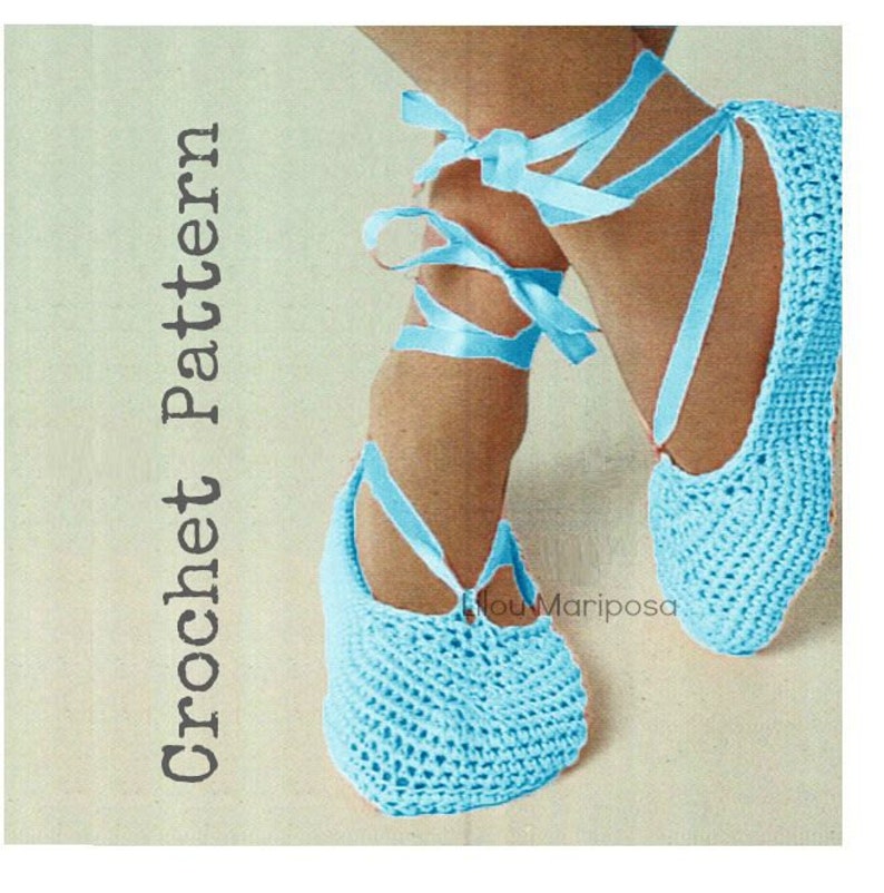 May include: Crochet pattern for blue ballet slippers with light blue satin ribbon ties. The pattern is titled "Crochet Pattern".