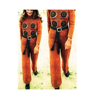 May include: A crocheted jumpsuit in a burnt orange color with a black belt and fringe. The jumpsuit features a geometric pattern with circular motifs.