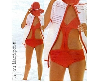 May include: A red crochet swimsuit with a cut-out design and a white crochet cover-up. The swimsuit has a high neckline and a low back. The cover-up has a hood and a long, flowing design.