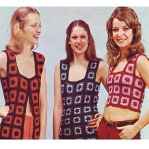 May include: Three women wearing sleeveless crocheted tops. The tops are made of squares in different colors, including red, pink, blue, and white. The women are wearing different colored pants.