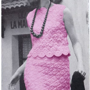 May include: A woman wearing a pink sleeveless dress with a scalloped hem and a black beaded necklace. The dress has a textured, quilted look.