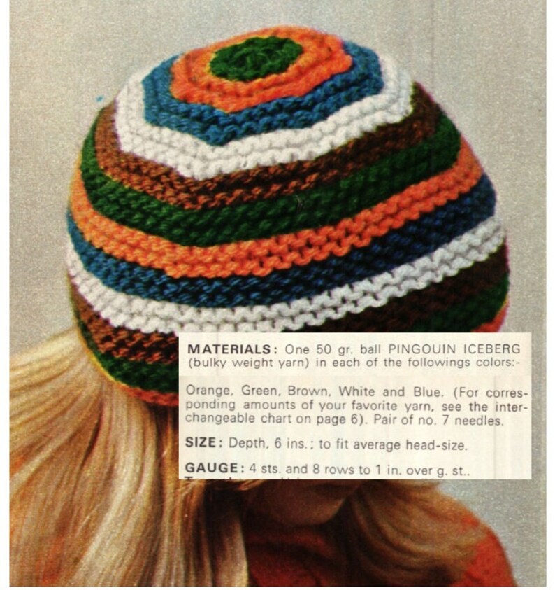 May include: A colorful striped knitted hat in orange, green, brown, white, and blue. The hat is made with bulky weight yarn and is 6 inches deep. The pattern is called "Pingouin Iceberg".