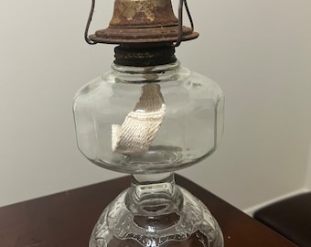 Vintage clear glass oil lamp