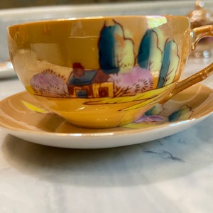 Vintage set of 4 small Japanese teacups & creamer