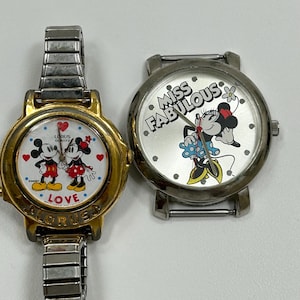 Vintage set of 2 Mickey Mouse and Minnie Mouse watches. Not tested.
