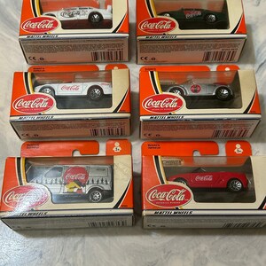 Lot of 6 new in a box 2002 Coca Cola Matchbox Mattel Wheels - 4” X 2” box