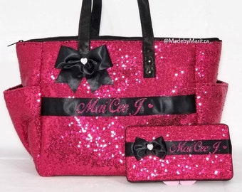 black and pink diaper bag