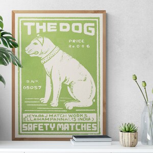 May include: A vintage green and white matchbox label with a white dog illustration and the text "THE DOG", "PRICE Re 0 0 6", "R.NO 65057", "JEYARAJ MATCH WORKS. ELLAIRAM PANNAI. (S INDIA)", and "SAFETY MATCHES".