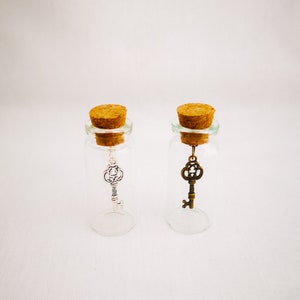 miniature glass bottle gift by under the blossom tree