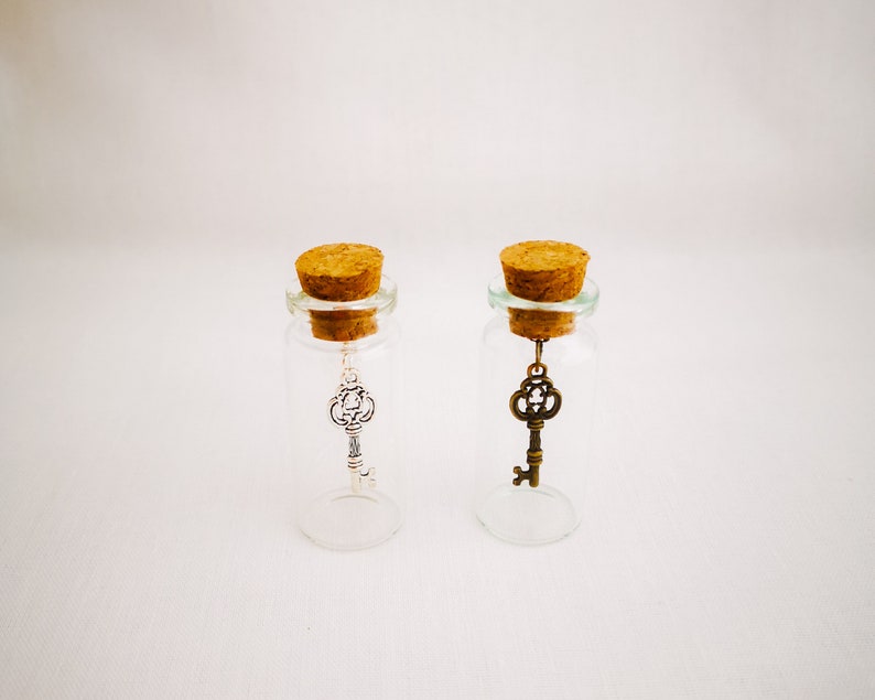 miniature glass bottle gift by under the blossom tree