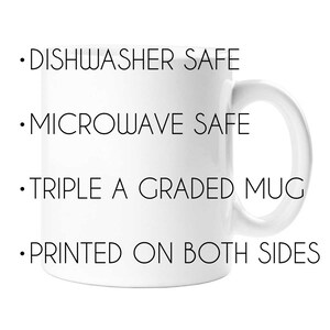 May include: White ceramic mug with black text that reads "DISHWASHER SAFE", "MICROWAVE SAFE", "TRIPLE A GRADED MUG", and "PRINTED ON BOTH SIDES".