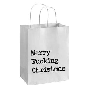 May include: White paper gift bag with twisted paper handles. The bag features the text "Merry Fucking Christmas" in a bold, black font. A festive and irreverent holiday gift bag.
