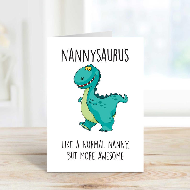 May include: A white card with a green dinosaur cartoon and the text "Nannysaurus Like a normal nanny, but more awesome".