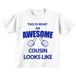 Cousin TShirt This Is What An Awesome Cousin Looks Like White Tshirt Blue Kids Sibling Text Children New Born Gift Present