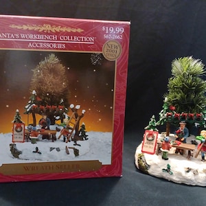 2001 Santa&#39;s Workbench Collection #567-2662 Wreath Seller - Santa&#39;s Workbench Collection Wreath Seller w/Box - Holiday Village Accessory