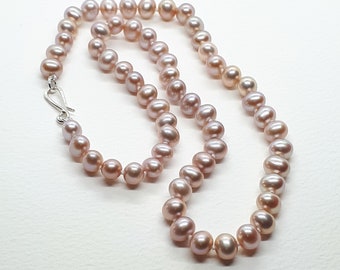 Pink pearl necklace with hallmarked silver hook catch.