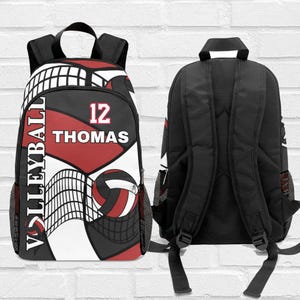 May include: Black backpack with a volleyball design. The front features a volleyball net, a volleyball, and the word "VOLLEYBALL" in white. The backpack also has the number "12" and the name "THOMAS" in white. The back of the backpack is solid black.