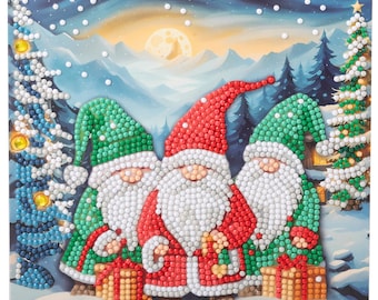 May include: Three gnomes wearing red, green, and white hats stand in front of a snowy mountain scene with a full moon. The gnomes are holding gifts and are smiling.