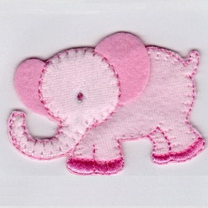 May include: Pink felt elephant applique with embroidered details. The elephant has a large pink ear and a curled trunk.