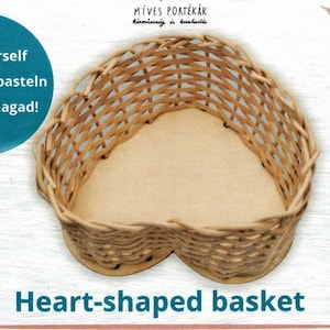 May include: A heart-shaped basket made of woven light brown wicker. The basket has a light tan base and is labeled "Heart-shaped basket". The image also includes text in other languages, including "Do-it-yourself".