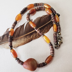 GG-160N) Natural Nickernut Seed Necklace with Shell and Horn Beads.