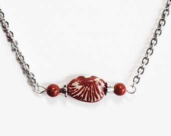 GG-178N) Rare Ping Zebra Lima Bean Necklace with Red Jasper Stones on Stainless Steel Chain.
