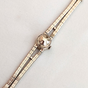 Art Deco 14k gold Longines women&#39;s wrist watch, hinged dial cover; fits wrist up to 5 1/2 inches; 21.2 grams; working