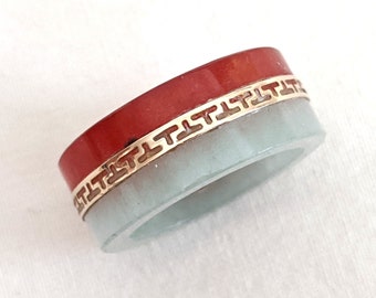 Chinese orange and light green jadeite ring, 14k gold fret band; size US 8 1/2, 3/8 inches high