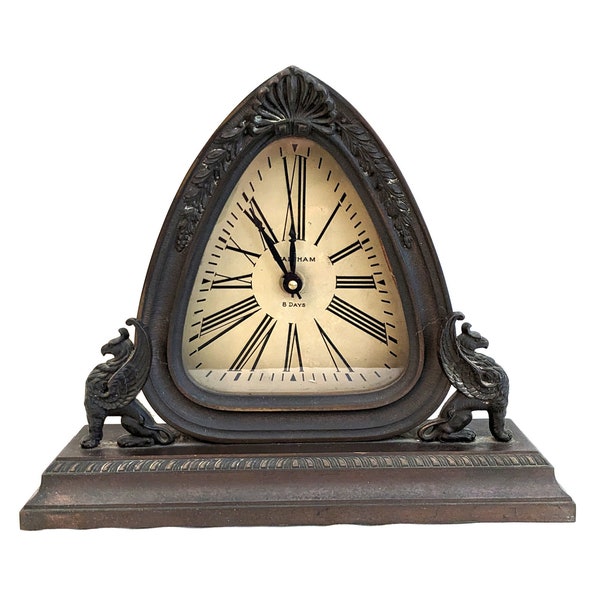 Art Deco era, Waltham 8 Days patinated metal clock with flanking griffins, new quartz movement, runs, 11 H x 13 3/8 W inches