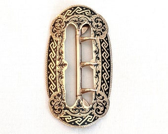 19th century 14k yellow gold belt buckle with black enamel trim; fits cloth belt up to 1 1/2 inches wide; 18.2 grams