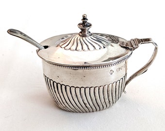 1893 London sterling mustard pot, cobalt blue glass liner; Sheffield silver plated spoon included; Horace Woodward & Co.