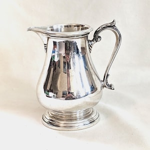 Shreve & Co of San Francisco sterling cream pitcher, 5 inches high, 317 grams, gilt interior, early 20th century