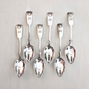 Group of 6 Finnish .813 silver spoons, fiddleback & shell pattern, made in 1948, 6 1/2 inches long