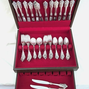 Cased set of 59 piece Wallace "Grand Baroque" flatware, no monogram, 72.49 weighable troy ounces