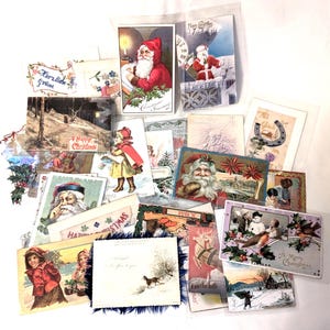 Gruppe von 30 Weihnachtspostkarten aus dem späten 19ten bis frühen 20ten Jahrhundert, Plastikhüllen, teilweise mit Schrift auf der Rückseite