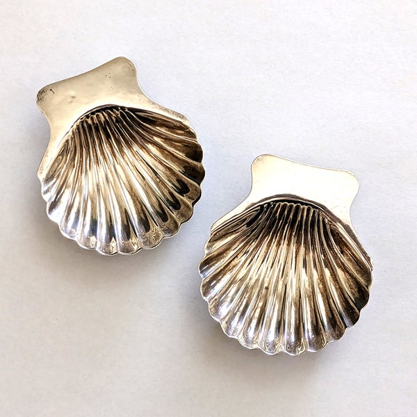 Two Marciel of Mexico sterling, shell form salt cellars, 3 ball feet; 2 7/8 W x 2 3/8 D inches, 48.4 grams