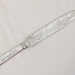 Chinese export silver cake knife, bamboo motif with hammered handle, monogram; 11 3/4 L inches, 120 grams