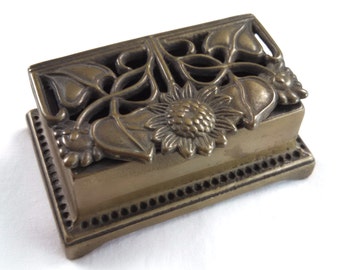 Art Nouveau style brass stamp box