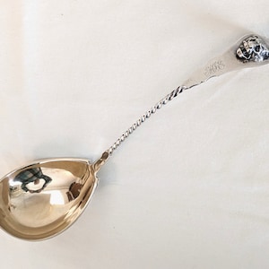 Coin silver, twist stem, lion&#39;s head handle punch ladle, gilt bowl, attributed to Gorham, 1 1/2 inches long, 135 grams