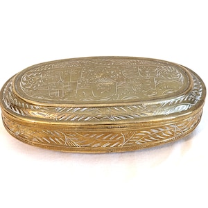 Dutch circa 1700, gilt, engraved brass tobacco box, aristocratic markings; 1 1/2 H x 5 1/8 W inches