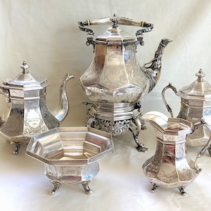 7 piece Lincoln & Reed of Boston coin silver tea set; large hot water pot with stand and lamp; 141.62 troy ounces; &#39;HFY&#39; 1847 monogram